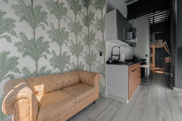 Elegantly designed living room with modern furnishings in an apartment at Building Eje Central Lázaro Cárdenas - mr-herold-homes - 1514998 in Mexico City, Mexico City