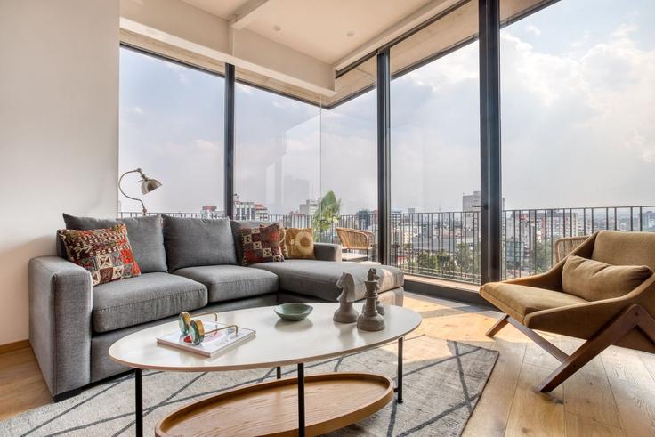 Mexico City Mexico CityのBuilding Londres 256 - mr-wmain - 1493155のアパートメントにある、モダンな家具を備えたエレガントなデザインのリビングルーム