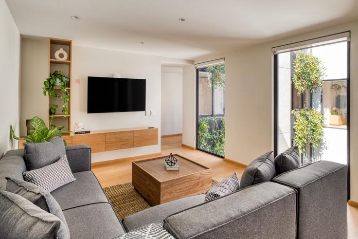 Elegant gestaltetes Wohnzimmer mit moderner Einrichtung in einer Wohnung im Building Calle Ometusco 104 - mr-wmain - 1493211 in Mexico City, Mexico City