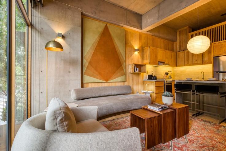 Elegant gestaltetes Wohnzimmer mit moderner Einrichtung in einer Wohnung im Building San Luis Potosí - mr-wmain - 1493194 in Mexico City, Mexico City