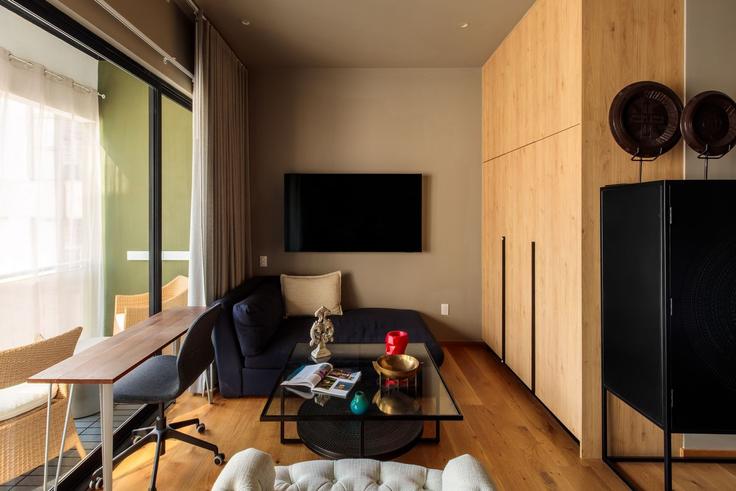 Mexico City, Mexico City에 위치한 Building Monterrey 147 - mr-wmain - 1493316 유닛의 세련된 인테리어가 돋보이는 거실 Mexico City, Mexico City에 위치한 Building Monterrey 147 - mr-wmain - 1493316 유닛의 세련된 인테리어가 돋보이는 거실