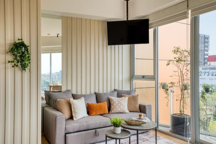 Elegant gestaltetes Wohnzimmer mit moderner Einrichtung in einer Wohnung im Building Calle de Durango 193 - mr-wmain - 1493286 in Mexico City, Mexico City