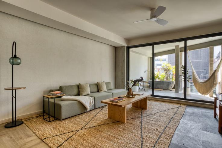 Elegante sala de estar con mobiliario moderno en un apartamento en Building Sinaloa - mr-wmain - 1493322 en Mexico City, Mexico City
