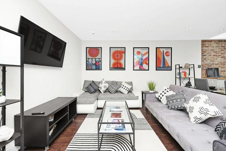 London London Borough of Tower HamletsのBuilding Ross Way - murraystays - 1039352のアパートメントにある、モダンな家具を備えたエレガントなデザインのリビングルーム London London Borough of Tower HamletsのBuilding Ross Way - murraystays - 1039352のアパートメントにある、モダンな家具を備えたエレガントなデザインのリビングルーム