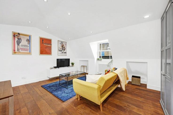 Elegante sala de estar con mobiliario moderno en un apartamento en Building Pownall Road - murraystays - 1039340 en London Borough of Hackney, London Elegante sala de estar con mobiliario moderno en un apartamento en Building Pownall Road - murraystays - 1039340 en London Borough of Hackney, London