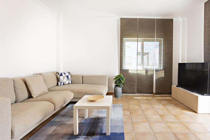 Sala de estar elegantemente projetada com móveis modernos em um apartamento no Building Rua Ilha da Abóbora - my-choice-algarve - 1363474 em Conceição de Tavira, Tavira