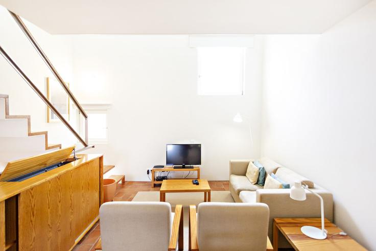 Elegante sala de estar con mobiliario moderno en un apartamento en Building Rua dos Mártires da República - my-choice-algarve - 1363496 en Santa Maria, Tavira