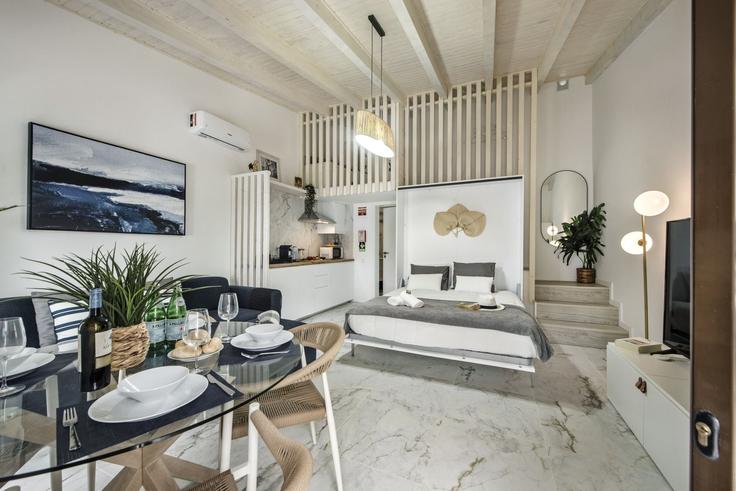 Faro Sé e São PedroのBuilding Travessa das Alcacarias - my-choice-algarve - 1363539のアパートメントにある、モダンな家具を備えたエレガントなデザインのリビングルーム