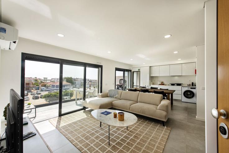 Elegant gestaltetes Wohnzimmer mit moderner Einrichtung in einer Wohnung im Building Largo da República - my-choice-algarve - 1363540 in Conceição de Tavira, Tavira Elegant gestaltetes Wohnzimmer mit moderner Einrichtung in einer Wohnung im Building Largo da República - my-choice-algarve - 1363540 in Conceição de Tavira, Tavira