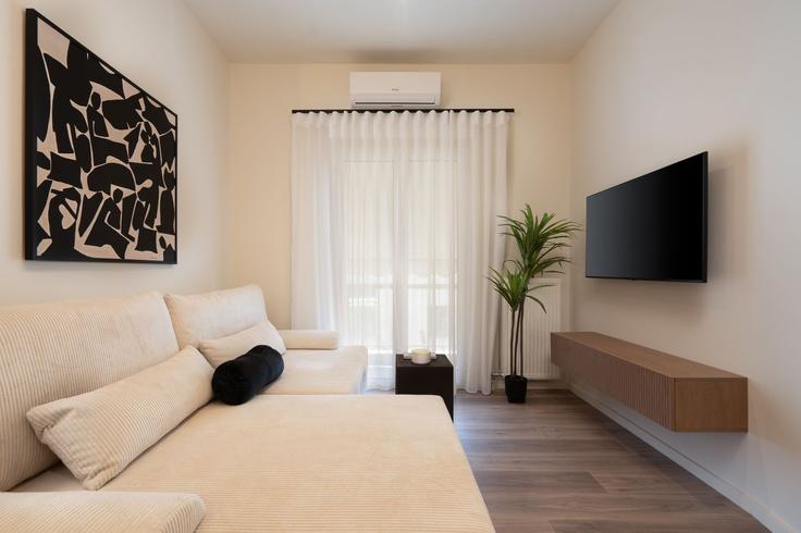 Elegant gestaltetes Wohnzimmer mit moderner Einrichtung in einer Wohnung im Building Karpou - my-greek-vacations - 1340911 in Central Athens, Athens Elegant gestaltetes Wohnzimmer mit moderner Einrichtung in einer Wohnung im Building Karpou - my-greek-vacations - 1340911 in Central Athens, Athens