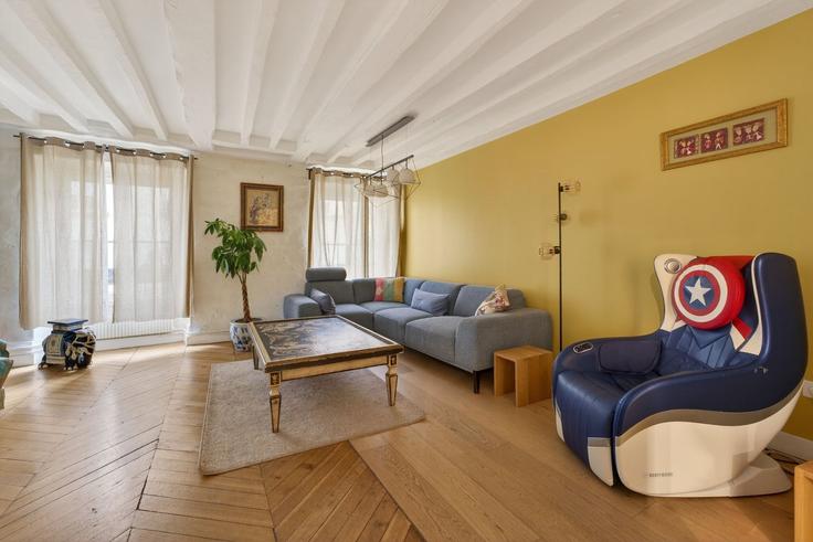 Sala de estar elegantemente projetada com móveis modernos em um apartamento no Building 89 Rue des Martyrs, Paris, France - my-property - 1581313 em 18th arrondissement, Paris Sala de estar elegantemente projetada com móveis modernos em um apartamento no Building 89 Rue des Martyrs, Paris, France - my-property - 1581313 em 18th arrondissement, Paris
