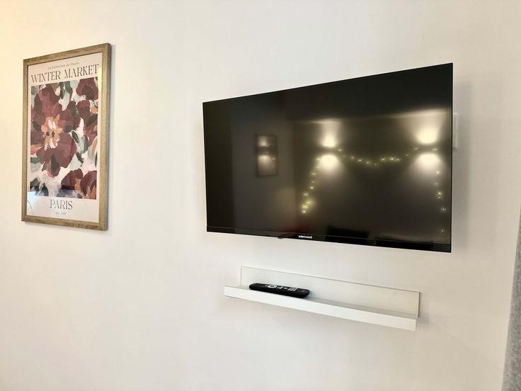 Elegant gestaltetes Wohnzimmer mit moderner Einrichtung in einer Wohnung im Building Passage Cardinet - my-suite-paris - 1388276 in 17th arrondissement, Paris