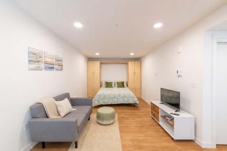 Salle de séjour élégante avec mobilier moderne dans un appartement à Building 11th Avenue East - my-vr-host - 1355614 à Seattle, Seattle