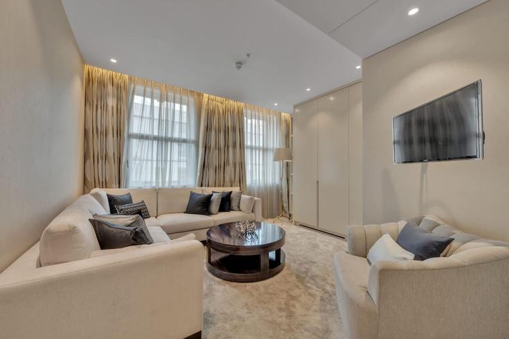 Elegante sala de estar con mobiliario moderno en un apartamento en Building Baker Street - mycityresidence - 1024982 - LON en City of Westminster, London