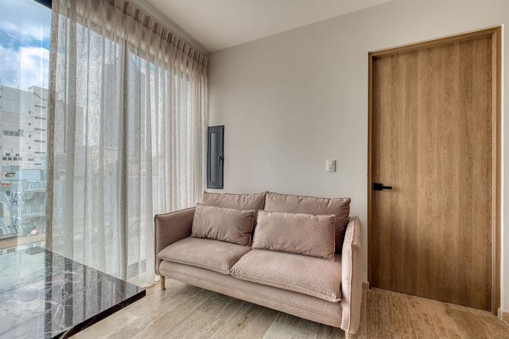 Mexico City Mexico CityのBuilding Salamanca - myla-stays - 1356986のアパートメントにある、モダンな家具を備えたエレガントなデザインのリビングルーム Mexico City Mexico CityのBuilding Salamanca - myla-stays - 1356986のアパートメントにある、モダンな家具を備えたエレガントなデザインのリビングルーム