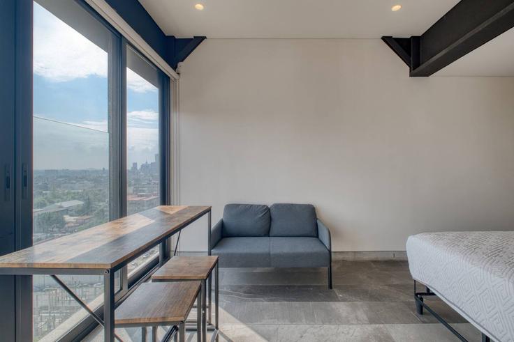 Elegant gestaltetes Wohnzimmer mit moderner Einrichtung in einer Wohnung im Building Avenida Marina Nacional - myla-stays - 1356994 in Mexico City, Mexico City Elegant gestaltetes Wohnzimmer mit moderner Einrichtung in einer Wohnung im Building Avenida Marina Nacional - myla-stays - 1356994 in Mexico City, Mexico City