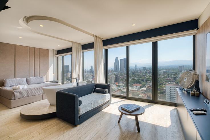 Elegante sala de estar con mobiliario moderno en un apartamento en Building Avenida Marina Nacional - myla-stays - 1357001 en Mexico City, Mexico City