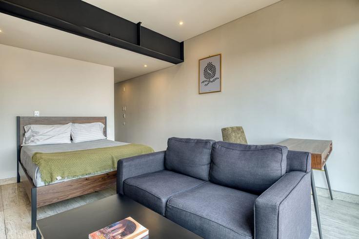 Sala de estar elegantemente projetada com móveis modernos em um apartamento no Building Avenida Marina Nacional - myla-stays - 1357013 em Mexico City, Mexico City Sala de estar elegantemente projetada com móveis modernos em um apartamento no Building Avenida Marina Nacional - myla-stays - 1357013 em Mexico City, Mexico City