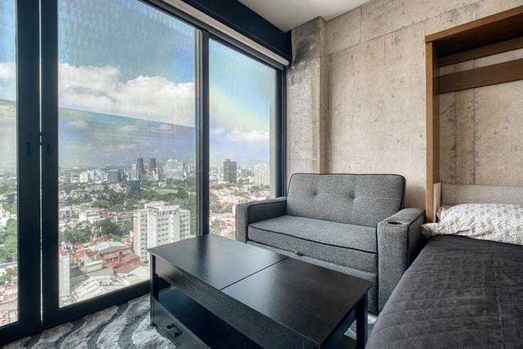 Elegant gestaltetes Wohnzimmer mit moderner Einrichtung in einer Wohnung im Building Avenida Marina Nacional - myla-stays - 1357015 in Mexico City, Mexico City Elegant gestaltetes Wohnzimmer mit moderner Einrichtung in einer Wohnung im Building Avenida Marina Nacional - myla-stays - 1357015 in Mexico City, Mexico City