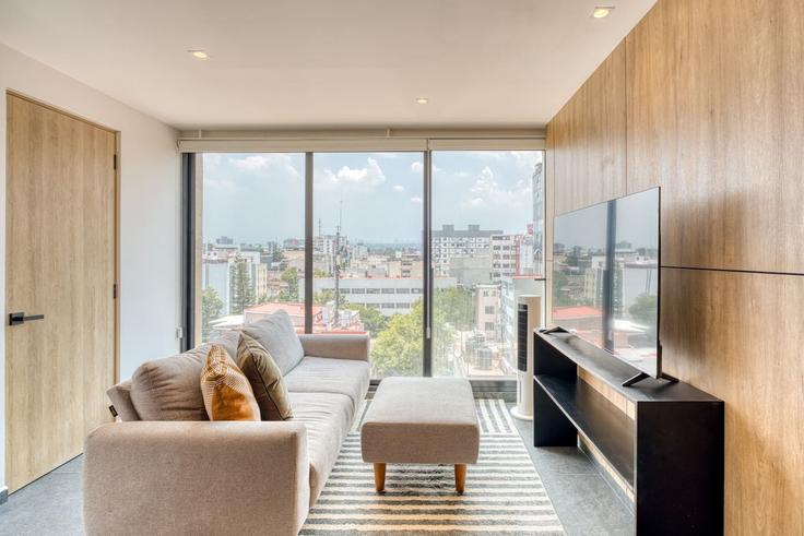 Elegante sala de estar con mobiliario moderno en un apartamento en Building Salamanca - myla-stays - 1570311 en Mexico City, Mexico City Elegante sala de estar con mobiliario moderno en un apartamento en Building Salamanca - myla-stays - 1570311 en Mexico City, Mexico City