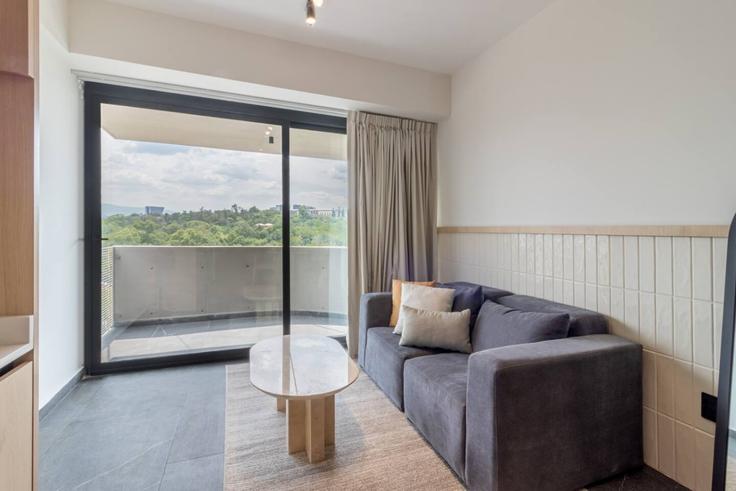 Mexico City, Mexico City에 위치한 Building Avenida José Vasconcelos - myla-stays - 1580256 유닛의 세련된 인테리어가 돋보이는 거실