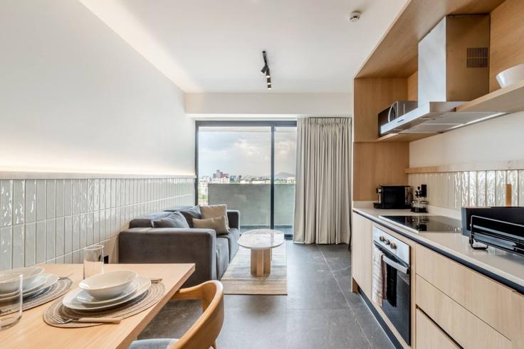 Mexico City Mexico CityのBuilding Avenida José Vasconcelos - myla-stays - 1626815のアパートメントにある、モダンな家具を備えたエレガントなデザインのリビングルーム Mexico City Mexico CityのBuilding Avenida José Vasconcelos - myla-stays - 1626815のアパートメントにある、モダンな家具を備えたエレガントなデザインのリビングルーム