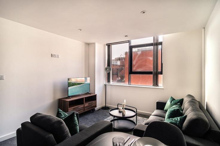 Sala de estar elegantemente projetada com móveis modernos em um apartamento no Building Guildhall Street - mypropertyhost - 1270297 - LON em City of Preston, Preston Sala de estar elegantemente projetada com móveis modernos em um apartamento no Building Guildhall Street - mypropertyhost - 1270297 - LON em City of Preston, Preston