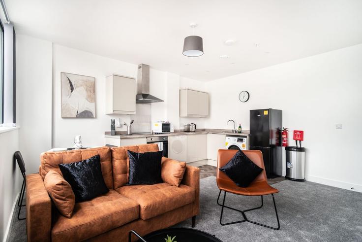 Elegante sala de estar con mobiliario moderno en un apartamento en Building Trinity Street - mypropertyhost - 1270341 - LON en Rhosddu, Wrexham Elegante sala de estar con mobiliario moderno en un apartamento en Building Trinity Street - mypropertyhost - 1270341 - LON en Rhosddu, Wrexham