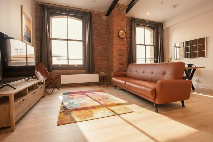 Elegant gestaltetes Wohnzimmer mit moderner Einrichtung in einer Wohnung im Building School Street - mypropertyhost - 1270087 - LON in Manchester, Manchester