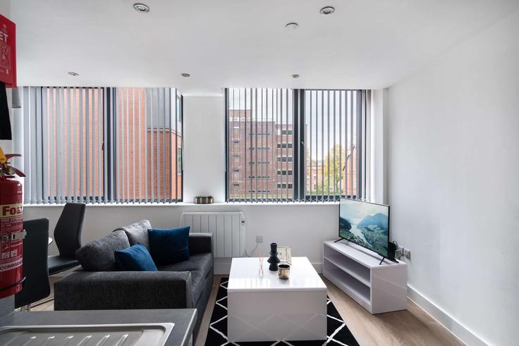Salle de séjour élégante avec mobilier moderne dans un appartement à Building Talbot Road - mypropertyhost - 1270254 - LON à Trafford, Manchester