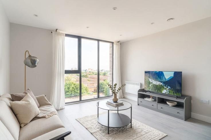 Sala de estar elegantemente projetada com móveis modernos em um apartamento no Building Oldfield Road - mypropertyhost - 1270224 - LON em City of Salford, Salford Sala de estar elegantemente projetada com móveis modernos em um apartamento no Building Oldfield Road - mypropertyhost - 1270224 - LON em City of Salford, Salford
