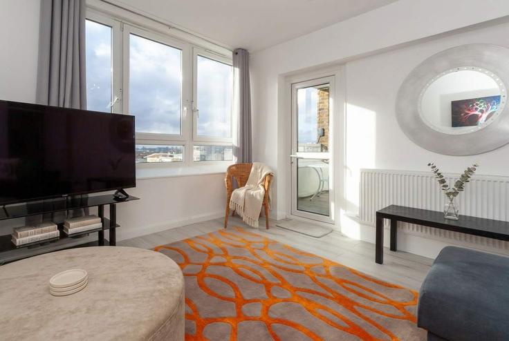 Elegante sala de estar con mobiliario moderno en un apartamento en Building Bath Street - mypropertyhost - 1054412 - LON en London Borough of Islington, London Elegante sala de estar con mobiliario moderno en un apartamento en Building Bath Street - mypropertyhost - 1054412 - LON en London Borough of Islington, London
