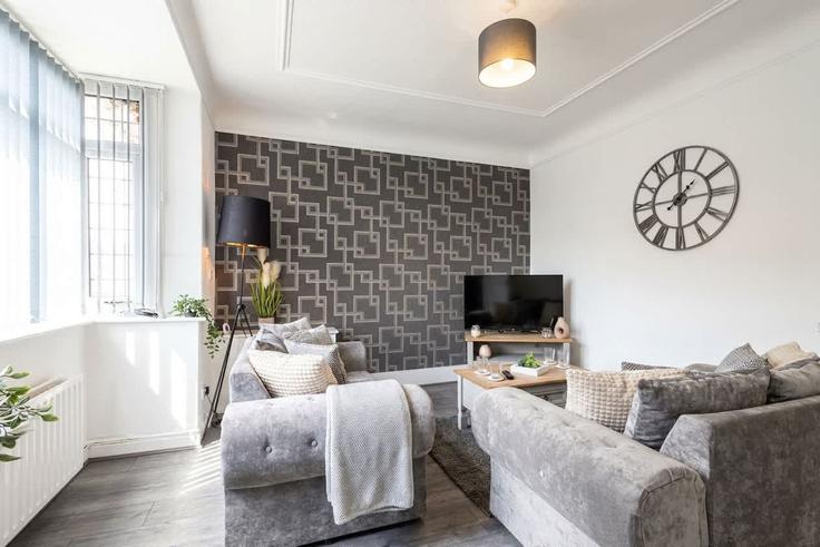 Elegante sala de estar con mobiliario moderno en un apartamento en Building Fleet Lane - mypropertyhost - 1270589 - LON en Metropolitan Borough of St Helens, Saint Helens Elegante sala de estar con mobiliario moderno en un apartamento en Building Fleet Lane - mypropertyhost - 1270589 - LON en Metropolitan Borough of St Helens, Saint Helens