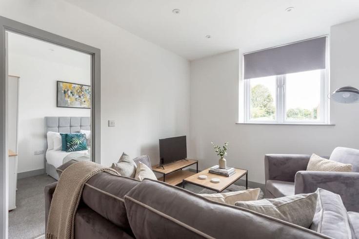 Elegante sala de estar con mobiliario moderno en un apartamento en Building Telford Terrace - mypropertyhost - 1270138 - LON en City of Leeds, Leeds Elegante sala de estar con mobiliario moderno en un apartamento en Building Telford Terrace - mypropertyhost - 1270138 - LON en City of Leeds, Leeds