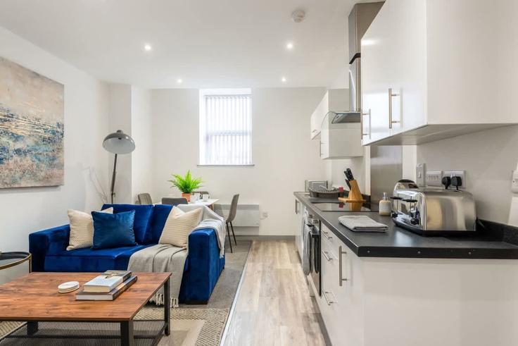 Doncaster City of DoncasterのBuilding Cleveland Street - mypropertyhost - 1270308 - LONのアパートメントにある、モダンな家具を備えたエレガントなデザインのリビングルーム Doncaster City of DoncasterのBuilding Cleveland Street - mypropertyhost - 1270308 - LONのアパートメントにある、モダンな家具を備えたエレガントなデザインのリビングルーム