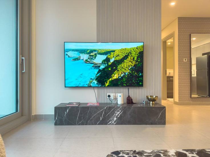 Sala de estar elegantemente projetada com móveis modernos em um apartamento no Building Sh Mohammed Bin Rashid Blvd - naseem - 1383991 em Downtown Dubai, Dubai