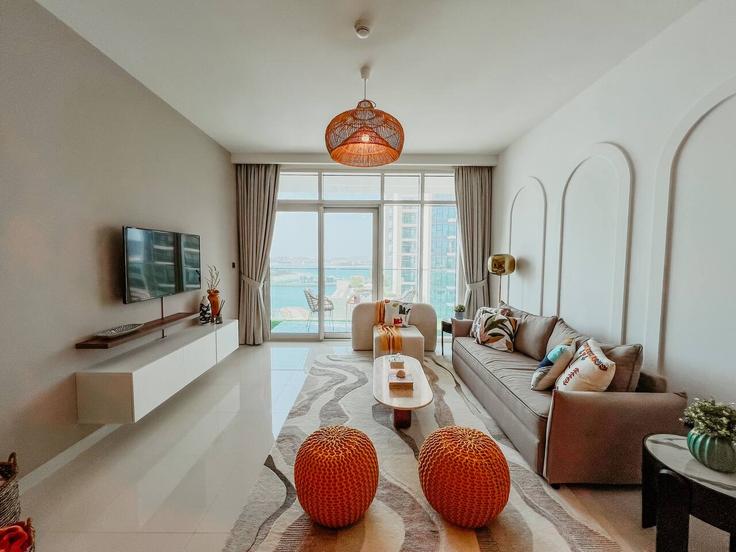 Elegantly designed living room with modern furnishings in an apartment at Building Tariaq Bedon Esm - nexusliving - 1053083 - DXB in The Palm Jumeirah, Dubai Elegantly designed living room with modern furnishings in an apartment at Building Tariaq Bedon Esm - nexusliving - 1053083 - DXB in The Palm Jumeirah, Dubai