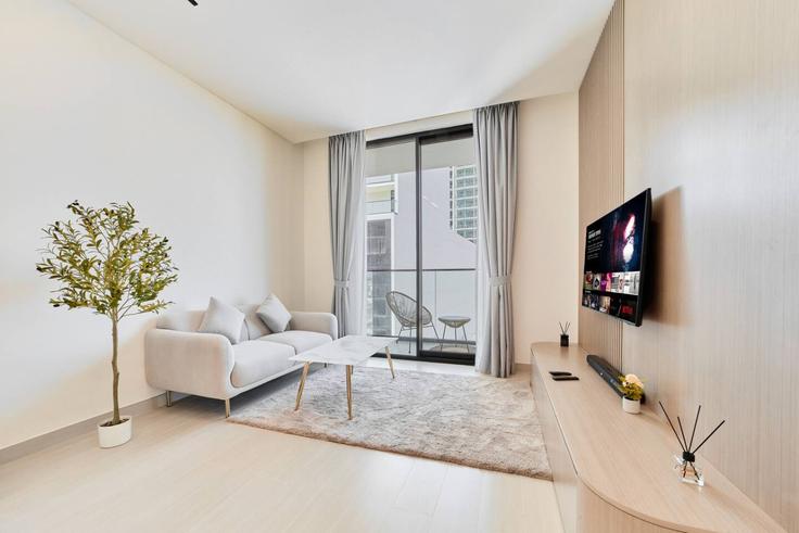 Elegantly designed living room with modern furnishings in an apartment at Building Street 7 - nexusliving - 1282838 - DXB in Jumeirah Village, Dubai