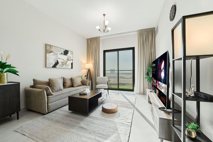 Elegant gestaltetes Wohnzimmer mit moderner Einrichtung in einer Wohnung im Building Tariaq Bedon Esm - nexusliving - 1357360 in Wadi Al Safa 3, Dubai