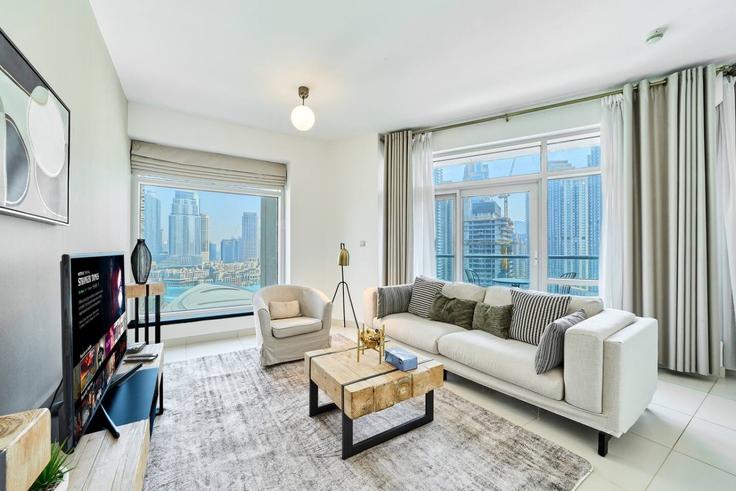 Dubai Downtown DubaiのBuilding The Lofts West - nexusliving - 1695451のアパートメントにある、モダンな家具を備えたエレガントなデザインのリビングルーム Dubai Downtown DubaiのBuilding The Lofts West - nexusliving - 1695451のアパートメントにある、モダンな家具を備えたエレガントなデザインのリビングルーム