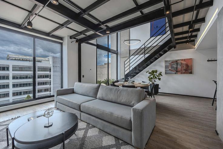 Elegant gestaltetes Wohnzimmer mit moderner Einrichtung in einer Wohnung im Building Carrera 13a - nok - 1643688 in Chapinero, Bogotá Elegant gestaltetes Wohnzimmer mit moderner Einrichtung in einer Wohnung im Building Carrera 13a - nok - 1643688 in Chapinero, Bogotá