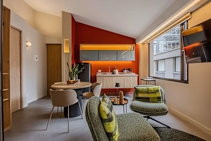 Sala de estar elegantemente projetada com móveis modernos em um apartamento no Building Calle 84A - nok - 1406997 em Chapinero, Bogotá