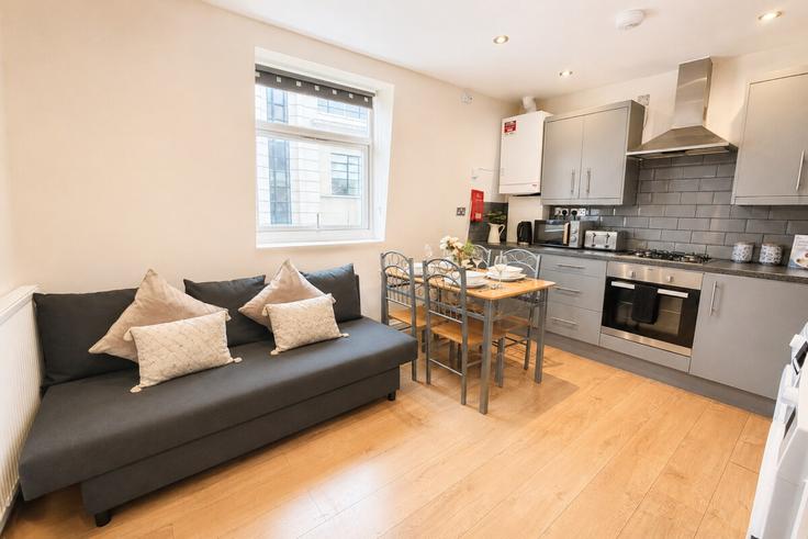 Building Batty Street E1 - nournest-apartments - 1570322 adresindeki bir dairede modern mobilyalarla zarif bir şekilde tasarlanmış oturma odası London Borough of Tower Hamlets, London