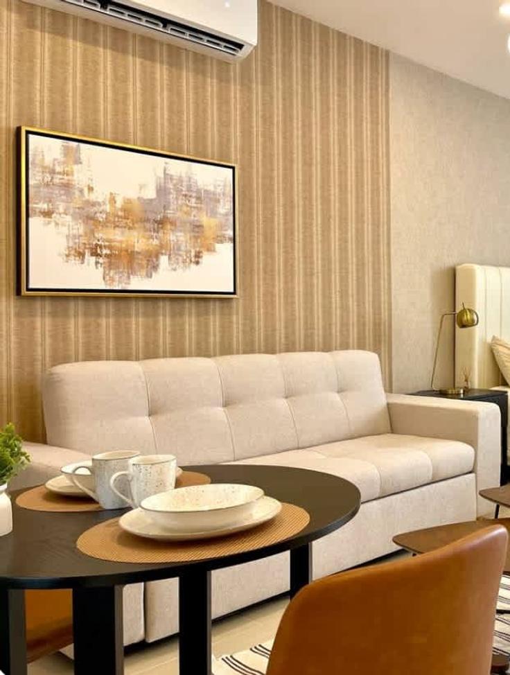 Elegante sala de estar con mobiliario moderno en un apartamento en Building Avenida Gaviotas - nuna-host - 1241039 - MEX en Mazatlan, Mazatlan