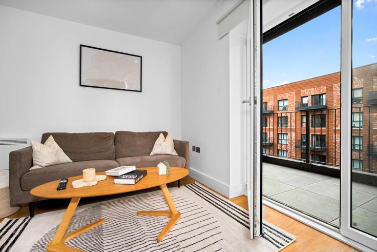 Salle de séjour élégante avec mobilier moderne dans un appartement à Building Hooper Street - nuvo-hotel-group-ltd - 1537935 à Birmingham District, Birmingham