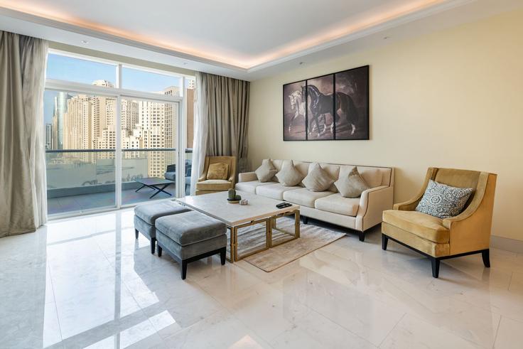 Elegantly designed living room with modern furnishings in an apartment at Building Al Mamsha Street - oak-tree-vacation-homes-rental - 1316339 in Dubai Marina, Dubai