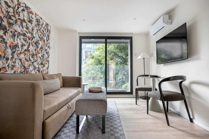 Salle de séjour élégante avec mobilier moderne dans un appartement à Building Río Nazas - oasis - 1378809 à Mexico City, Mexico City