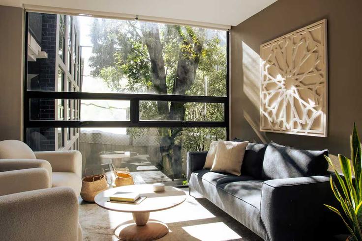 Elegante sala de estar con mobiliario moderno en un apartamento en Building Minería - oasis - 1378805 en Mexico City, Mexico City Elegante sala de estar con mobiliario moderno en un apartamento en Building Minería - oasis - 1378805 en Mexico City, Mexico City