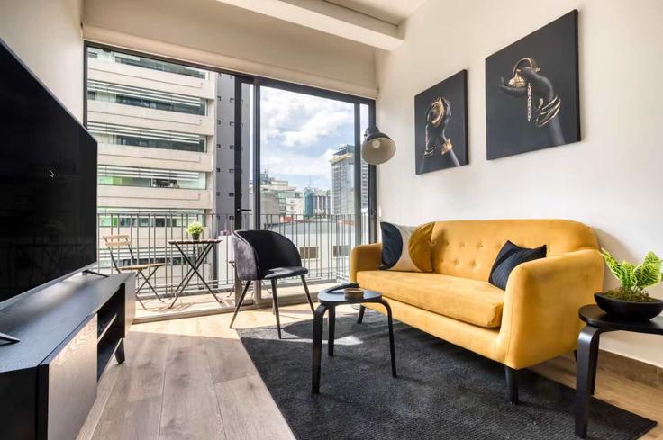 Salle de séjour élégante avec mobilier moderne dans un appartement à Building Londres - oasis - 1378824 à Mexico City, Mexico City