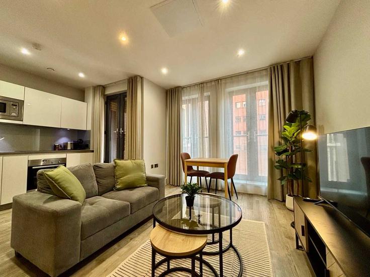 Salle de séjour élégante avec mobilier moderne dans un appartement à Building Great Tower Street - oasis - 1643119 à City of London, London Salle de séjour élégante avec mobilier moderne dans un appartement à Building Great Tower Street - oasis - 1643119 à City of London, London